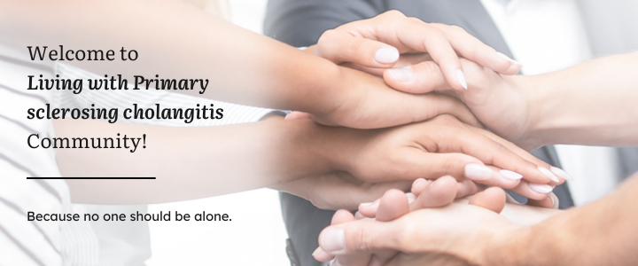 A welcome banner for Living With Primary Sclerosing Cholangitis (PSC) community featuring a group of hands symbolizing unity